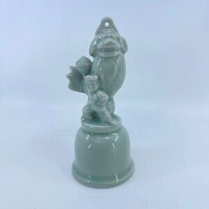vintage chinese celadon green ceramic dragon bell with fish and child motifs